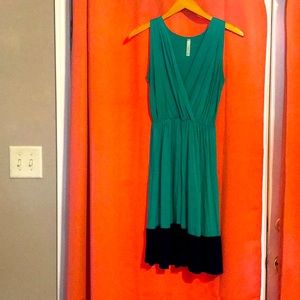 Green dress with navy blue trim size small.